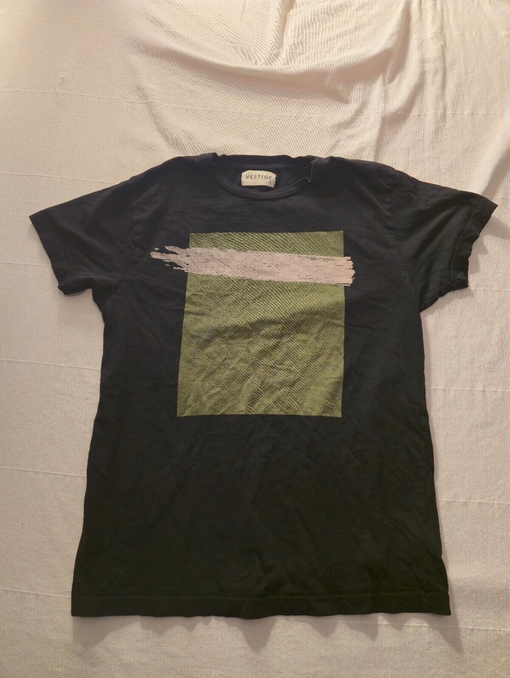 Vestige Black Graphic T-Shirt with Green and White Design, Size Medium